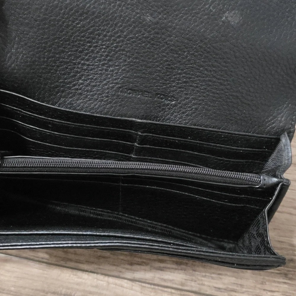 Michael Kors Fulton Large Flap Continental Wallet in black pebbled leather